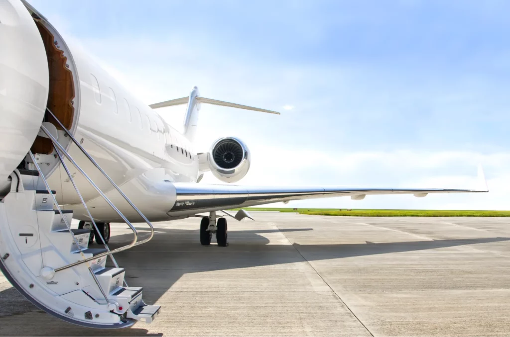 Private jet awaiting passengers for return flight booked with acx travel.