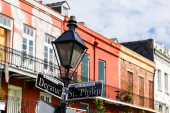 Street sign in new orleans taken on culture tour booked with acx travel.