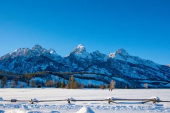 Grand teton mountain range during winter book winter get aways with acx travel.
